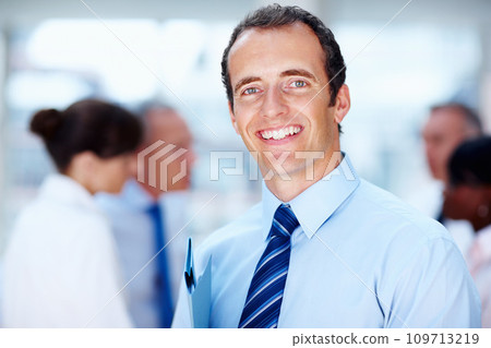 Happy, meeting and portrait of business man with team for collaboration, leadership and management. Corporate worker, company and face of manager for professional career, job and work in office 109713219