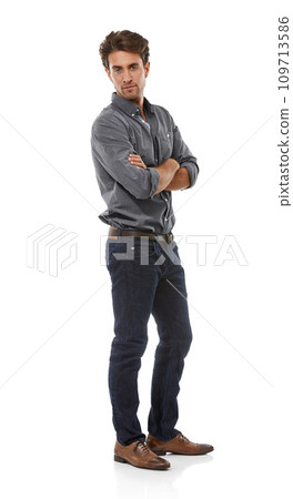 Man, arms crossed and studio portrait with fashion, trendy style and shirt with confidence by white background. Person, guy or model with cool denim jeans, edgy clothes and pride from Argentina Man, arms crossed and studio portrait with fashion, trendy style and shirt with confidence by white background. Person, guy or model with cool denim jeans, edgy clothes and pride from Argentina 109713586