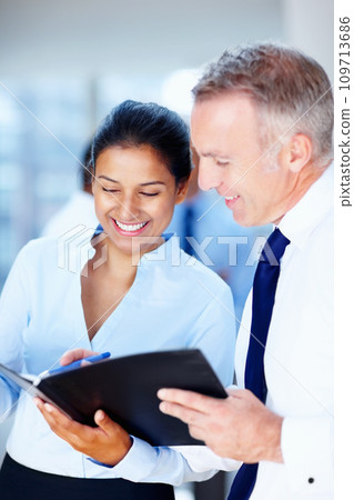 Professional people, manager and folder for teamwork, planning or advice in human resources and office meeting. Business woman, mentor or mature manager with documents, report or schedule management Professional people, manager and folder for teamwork, planning or advice in human resources and office meeting. Business woman, mentor or mature manager with documents, report or schedule management 109713686