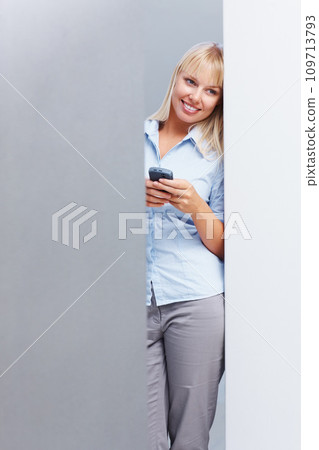 Businesswoman, thinking and smartphone in studio for corporate career with technology in mockup. Young person, idea and cellphone as professional consultant with online website with gray background Businesswoman, thinking and smartphone in studio for corporate career with technology in mockup. Young person, idea and cellphone as professional consultant with online website with gray background 109713793