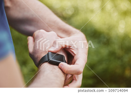 Hands, runner and check smart watch in park for steps, data or time app with results, fitness or nature. Person, iot clock or monitor for speed, heart rate or reading for exercise, workout or health 109714094