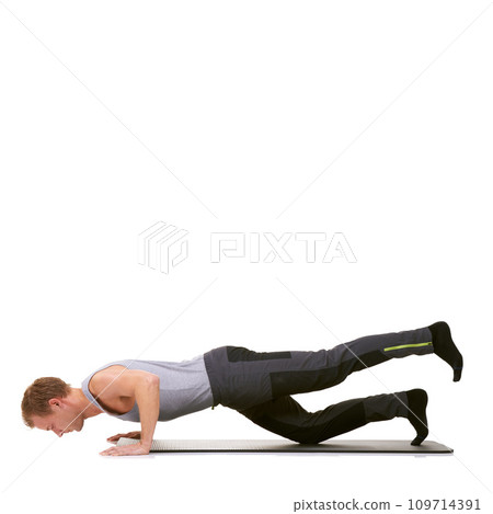 Man, pilates and mat in studio for push ups, fitness or workout for healthy body, wellness or core muscle. Person, exercise or yoga on floor for abdomen health on mockup space or white background 109714391