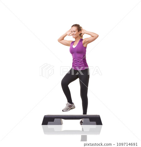 Aerobics, fitness and woman with exercise, training and wellness isolated on a white studio background. Person, model and girl with workout, healthy and balance with routine, weight loss and smile 109714691