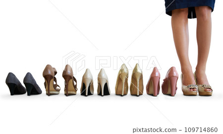 Woman, many shoes and studio floor with choice, mockup space and feet for fashion by white background. Person, model and high heels for trendy style, decision and legs for promotion with retail deal 109714860