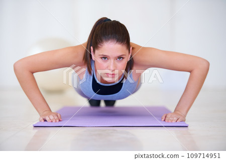 Push up, fitness and portrait of woman in gym for challenge, workout and exercise for muscles. Sports, endurance and person training on floor for wellness, healthy body and strength on yoga mat 109714951