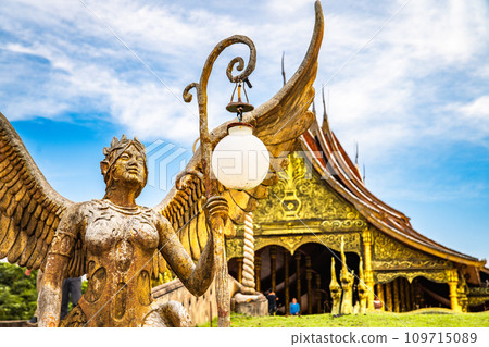 Wat Sirindhorn Wararam glowing temple in Ubon, Thailand 109715089