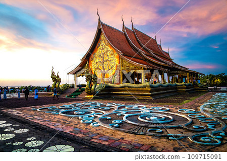 Wat Sirindhorn Wararam glowing temple in Ubon, Thailand 109715091