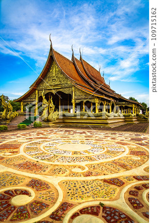 Wat Sirindhorn Wararam glowing temple in Ubon, Thailand 109715162