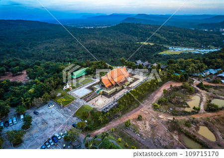 Aerial view of Wat Sirindhorn Wararam glowing temple in Ubon, Thailand 109715170