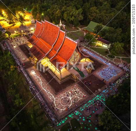 Aerial view of Wat Sirindhorn Wararam glowing temple in Ubon, Thailand Aerial view of Wat Sirindhorn Wararam glowing temple in Ubon, Thailand 109715183