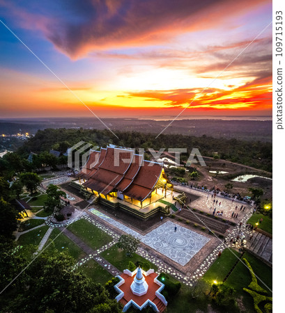 Aerial view of Wat Sirindhorn Wararam glowing temple in Ubon, Thailand Aerial view of Wat Sirindhorn Wararam glowing temple in Ubon, Thailand 109715193