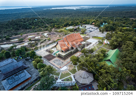 Aerial view of Wat Sirindhorn Wararam glowing temple in Ubon, Thailand Aerial view of Wat Sirindhorn Wararam glowing temple in Ubon, Thailand 109715204