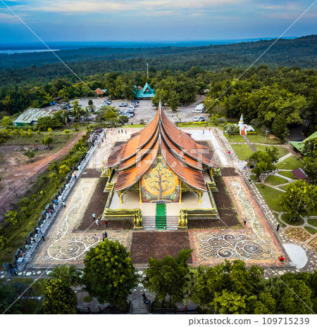 Aerial view of Wat Sirindhorn Wararam glowing temple in Ubon, Thailand 109715239