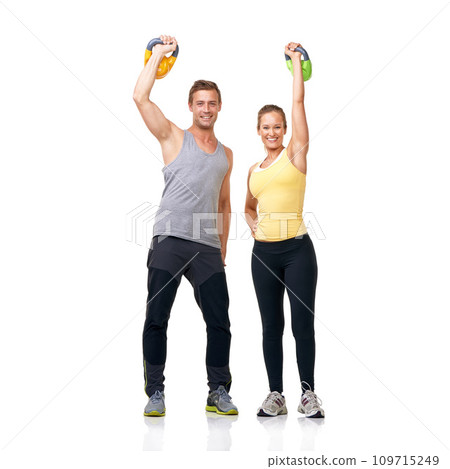 Studio portrait, kettlebell exercise and happy people celebrate muscle growth, strength progress or weightlifting success. Winner, bodybuilding achievement and athlete team goals on white background 109715249