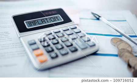 Inflation, calculator and financial crisis document with money, coins or finance problem in the economy crash. Paperwork, accounting and information on stock exchange for bad investment or budget Inflation, calculator and financial crisis document with money, coins or finance problem in the economy crash. Paperwork, accounting and information on stock exchange for bad investment or budget 109716052