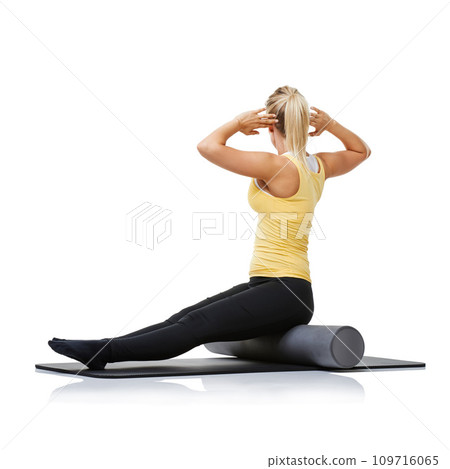 Yoga fitness, foam roller and person stretching back for spine posture training, wellness challenge or active performance. Studio floor, exercise mat and athlete physical activity on white background Yoga fitness, foam roller and person stretching back for spine posture training, wellness challenge or active performance. Studio floor, exercise mat and athlete physical activity on white background 109716065
