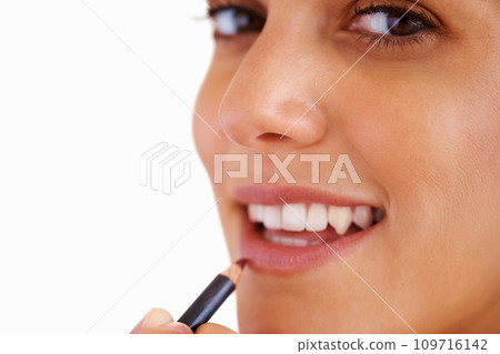 Woman, face and lipliner with smile for beauty, cosmetics and facial skincare for grooming in studio. Person, happy and lipstick application with product or pencil for makeup, cosmetology and mock up Woman, face and lipliner with smile for beauty, cosmetics and facial skincare for grooming in studio. Person, happy and lipstick application with product or pencil for makeup, cosmetology and mock up 109716142