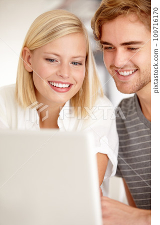 Laptop, smile and love with a young couple in their apartment for planning or investing together. Computer, online or ecommerce with a happy man and woman in the home for portfolio, website or growth Laptop, smile and love with a young couple in their apartment for planning or investing together. Computer, online or ecommerce with a happy man and woman in the home for portfolio, website or growth 109716170