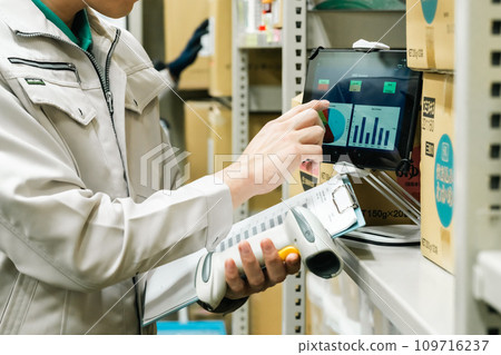 Inventory management on tablet faceless Inventory management on tablet faceless 109716237