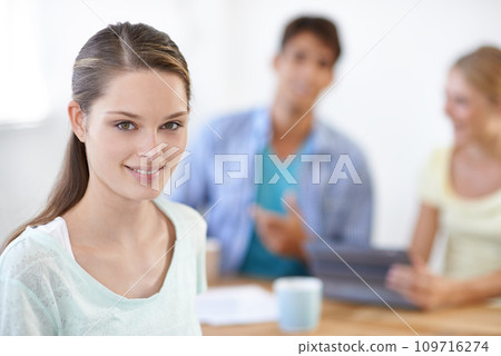 Smile, portrait and young woman in meeting in office for project planning or brainstorming. Happy, team and closeup of professional female designer from Australia working with paperwork in workplace. 109716274