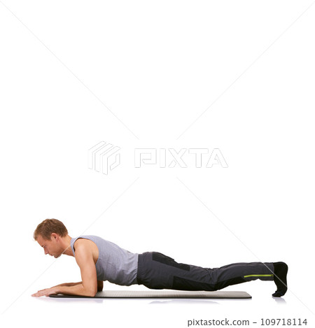 Man, plank and mat in studio for exercise, fitness or workout for healthy body, wellness or core muscle. Person, training and balance on floor for abdomen health on mock up space or white background 109718114