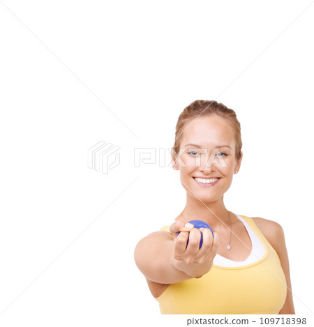 Stress ball, portrait and happy woman in studio for fitness and arm exercise with smile. Health, equipment and toung female person from Canada with anxiety relief isolated by white background. 109718398