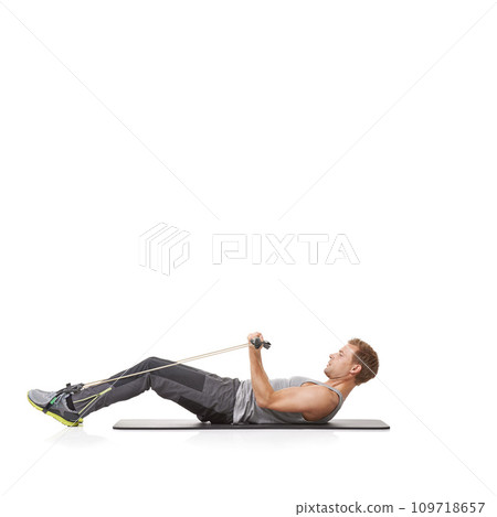 Healthy, man and resistance band with fitness, training and wellness isolated on white studio background. Mockup space, person and model with workout, exercise and progress with energy and endurance Healthy, man and resistance band with fitness, training and wellness isolated on white studio background. Mockup space, person and model with workout, exercise and progress with energy and endurance 109718657