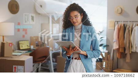 Woman, fashion designer and tablet in logistics, research or small business management at boutique. Female person or entrepreneur working on technology for inventory or storage check at retail store Woman, fashion designer and tablet in logistics, research or small business management at boutique. Female person or entrepreneur working on technology for inventory or storage check at retail store 109718662