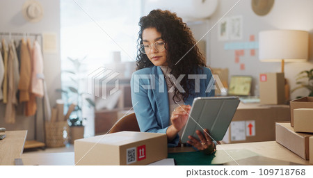 Business woman, tablet and box in logistics for inventory inspection, stock take or storage check at boutique. Female person or fashion designer with technology, parcel or package for courier service Business woman, tablet and box in logistics for inventory inspection, stock take or storage check at boutique. Female person or fashion designer with technology, parcel or package for courier service 109718768