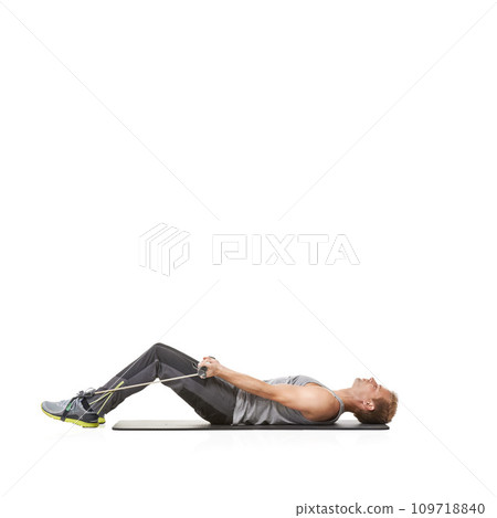 Exercise, man and resistance band with training, stretching and healthy isolated on white studio background. Mockup space, person and model with workout, wellness or progress with energy or endurance Exercise, man and resistance band with training, stretching and healthy isolated on white studio background. Mockup space, person and model with workout, wellness or progress with energy or endurance 109718840