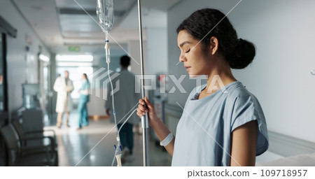 Sad, healthcare and a woman with an iv drip at hospital for medicine, wellness and recovery from virus. Depression, thinking and a clinic patient with treatment stress, burnout or anxiety while sick Sad, healthcare and a woman with an iv drip at hospital for medicine, wellness and recovery from virus. Depression, thinking and a clinic patient with treatment stress, burnout or anxiety while sick 109718957