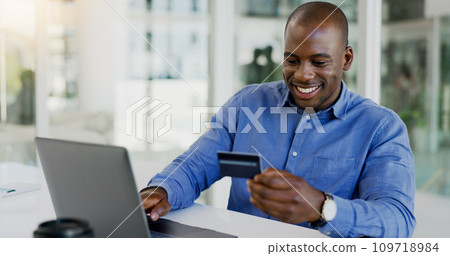 Business man, credit card and laptop for office online shopping, e commerce payment and happy loan. African employee on computer for web banking, financial investment or registration for debit order 109718984