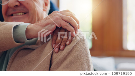 Caregiver, helping hand and senior man with support in retirement, nursing home or empathy for kindness. Elderly care, nurse and hands on shoulder together and healthcare service in apartment 109719190