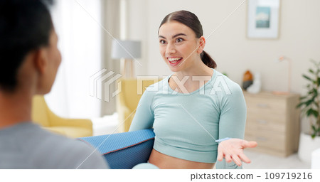 Friends, yoga and women in home in conversation for wellness, healthy body and training. Personal trainer, living room and people talking with gym mat for pilates, exercise and workout together 109719216