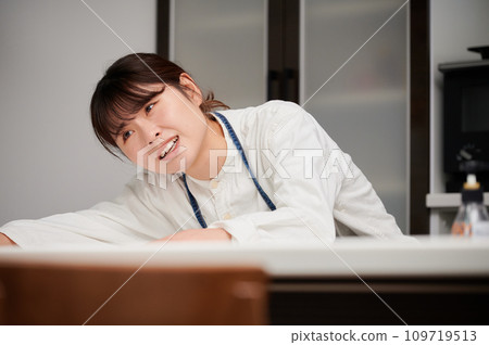 A depressed woman in the kitchen, sad, painful, thinking A depressed woman in the kitchen, sad, painful, thinking 109719513