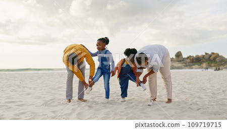 Summer, sand and a black family at the beach with shoes for walking or running together. Happy, travel and African children with parents getting ready for playing by the sea during a holiday 109719715