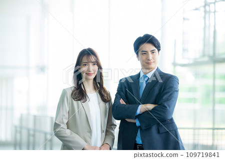 Business team of men and women standing side by side 109719841