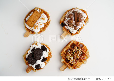 cookies chocolate and whipped cream on croissant waffle cookies chocolate and whipped cream on croissant waffle 109720032
