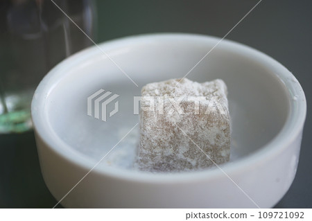 turkish delight or lokum of white in a small container  turkish delight or lokum of white in a small container  109721092