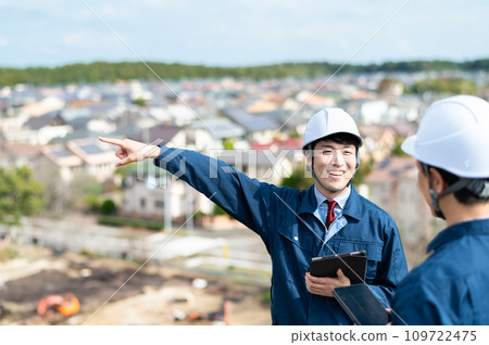 Image of a man in work clothes, construction, and real estate Image of a man in work clothes, construction, and real estate 109722475