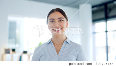 Smile, portrait and business woman in the office with confident, good and positive attitude. Happy, pride and headshot of professional young female lawyer from Canada standing in modern workplace. 109723432