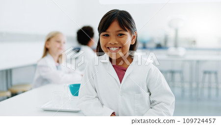 Portrait, girl and child in laboratory for science, knowledge or learning about chemistry with smile and lab coat. Face, student and kid with happiness in classroom, workshop or academy for education Portrait, girl and child in laboratory for science, knowledge or learning about chemistry with smile and lab coat. Face, student and kid with happiness in classroom, workshop or academy for education 109724457