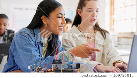 Robotics, children and education with laptop at school learning coding, robot or programming. Girl students in classroom for technology, electronics or science for development, innovation or teamwork Robotics, children and education with laptop at school learning coding, robot or programming. Girl students in classroom for technology, electronics or science for development, innovation or teamwork 109725013