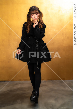 woman in gothic loli clothes woman in gothic loli clothes 109725334