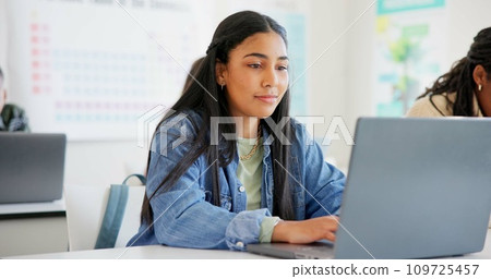 Woman, student and laptop for classroom education, e learning and studying or research in college. Young people typing on computer for university or school information, FAQ or scholarship application Woman, student and laptop for classroom education, e learning and studying or research in college. Young people typing on computer for university or school information, FAQ or scholarship application 109725457