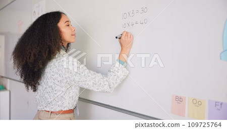Female teacher, writing and board for mathematics, study and happy for education career with presentation. Woman, classroom and learning expert with pen, problem or challenge for student development 109725764