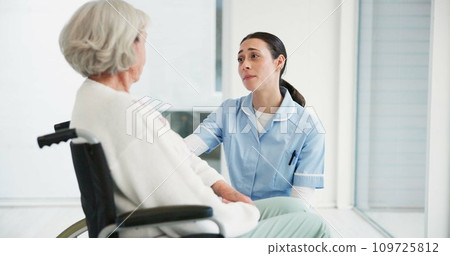 Medical, wheelchair and a woman nurse talking to a senior patient with a disability in a clinic. Healthcare, retirement and support with a female medicine professional talking to a resident at home 109725812