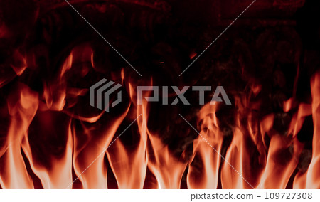 Flames texture background on a black background 109727308