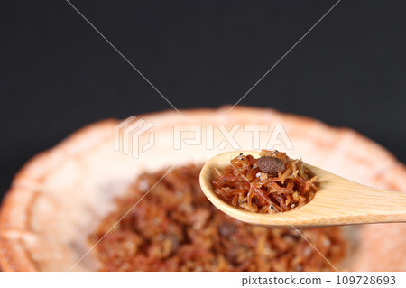 Chirimenjako tsukudani served on a spoon Chirimenjako tsukudani served on a spoon 109728693