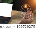 Businessman holding virtual five stars for customer feedback 109729275